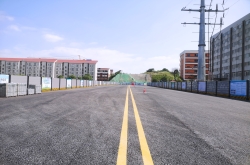托子沖南路主幅路通車，新學(xué)校旁拉通了一條便民路